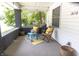 Inviting front porch with seating, a small table, and charming decor, creating a relaxing outdoor space at 2650 S Meridian St, Indianapolis, IN 46225
