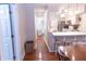 View of the kitchen with stainless steel appliances and a breakfast bar with seating at 2650 S Meridian St, Indianapolis, IN 46225