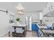 Updated kitchen with white cabinets, stainless steel appliances, and a center island with seating at 2829 Dakota Dr, Anderson, IN 46012