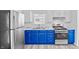 Bright kitchen with stainless steel appliances, white cabinets, and blue lower cabinets at 2829 Dakota Dr, Anderson, IN 46012