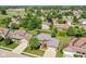 Community aerial showcasing lush landscaping, mature trees, and well-spaced homes at 3050 Montgomery Blvd, Lapel, IN 46051