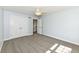 Bright bedroom with carpeted floor, ceiling fan, and closet storage at 3050 Montgomery Blvd, Lapel, IN 46051