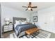 Comfortable bedroom with neutral walls, modern ceiling fan, and large closets at 3050 Montgomery Blvd, Lapel, IN 46051