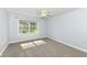 Comfortable bedroom with carpeted floor, ceiling fan, and natural light at 3050 Montgomery Blvd, Lapel, IN 46051