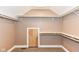 Walk-in closet featuring carpet flooring and painted wood shelving and racks at 3050 Montgomery Blvd, Lapel, IN 46051