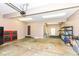 Spacious garage with overhead lighting and storage at 3050 Montgomery Blvd, Lapel, IN 46051