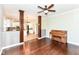 Open floor plan featuring hardwood floors with views of the kitchen at 3050 Montgomery Blvd, Lapel, IN 46051