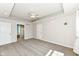 Bedroom with a ceiling fan with an open door to bathroom at 3050 Montgomery Blvd, Lapel, IN 46051