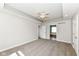 Bright carpeted bedroom boasts a ceiling fan and recessed lighting at 3050 Montgomery Blvd, Lapel, IN 46051