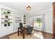 Home office with built-in bookcases and natural light at 3050 Montgomery Blvd, Lapel, IN 46051