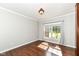 Clean, empty room with window letting in natural light at 3050 Montgomery Blvd, Lapel, IN 46051