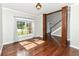 Empty room with hardwood floors and big windows at 3050 Montgomery Blvd, Lapel, IN 46051