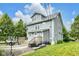 Well-maintained backyard featuring a patio, deck, grill, and lush lawn, ideal for outdoor relaxation and entertainment at 3101 N Washington Blvd, Indianapolis, IN 46205