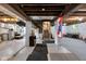 Spacious unfinished basement with exposed wood beams and concrete columns at 3101 N Washington Blvd, Indianapolis, IN 46205