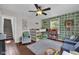 bedroom with bunk beds, wood floors, and gray chair at 3101 N Washington Blvd, Indianapolis, IN 46205