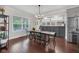 Elegant dining room with hardwood floors and plenty of natural light at 3101 N Washington Blvd, Indianapolis, IN 46205