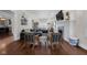 Bright living room boasts fireplace, hardwood floors and contemporary furniture at 3101 N Washington Blvd, Indianapolis, IN 46205