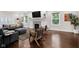 Cozy living room featuring fireplace, hardwood floors and comfortable seating at 3101 N Washington Blvd, Indianapolis, IN 46205