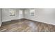 The living room features hardwood floors, fresh paint, and natural light at 319 S Webster Ave, Indianapolis, IN 46219