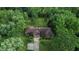 Aerial view of house with mature landscaping and a long driveway at 3711 Tara Ct, Carmel, IN 46074