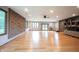 Large basement featuring a rock climbing wall, hardwood floors, lots of windows and a backyard exit at 3711 Tara Ct, Carmel, IN 46074