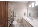 A clean bathroom offers a neutral color scheme and tiled floors at 3711 Tara Ct, Carmel, IN 46074