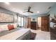 A relaxing bedroom features a comfortable bed, neutral walls, and wood trim at 3711 Tara Ct, Carmel, IN 46074