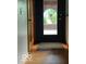Inviting front entrance with a modern black door and clear glass pane for lots of natural light at 3711 Tara Ct, Carmel, IN 46074