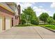 Spacious backyard with a basketball court and lush landscaping at 3893 Bent Tree Ln, Greenwood, IN 46143