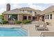 Backyard pool, patio, and outdoor dining create an entertainer's dream at 3893 Bent Tree Ln, Greenwood, IN 46143