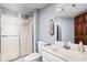 Bathroom with shower, toilet, vanity with sink, and a wall mirror at 3893 Bent Tree Ln, Greenwood, IN 46143