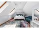 Spacious bedroom boasts vaulted ceilings and an accent carpet at 3893 Bent Tree Ln, Greenwood, IN 46143