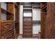 Walk-in closet featuring custom shelving and storage at 3893 Bent Tree Ln, Greenwood, IN 46143