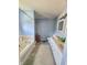 Bright bathroom featuring light blue walls, a vanity, and tub and shower combination at 430 N Greenbriar Dr, Greenwood, IN 46142