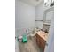 Bathroom features tile floors, neutral paint, and single vanity at 430 N Greenbriar Dr, Greenwood, IN 46142