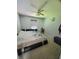 A bright bedroom featuring neutral decor, a ceiling fan, and a double bed at 430 N Greenbriar Dr, Greenwood, IN 46142