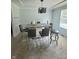 Dining room with seating for six and stylish lighting at 430 N Greenbriar Dr, Greenwood, IN 46142