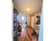 Hallway with hard surface floors and white doors at 430 N Greenbriar Dr, Greenwood, IN 46142