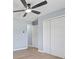 Bedroom with light grey walls, closet and neutral flooring at 4305 Five Points Rd, Indianapolis, IN 46239