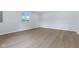 Spacious bonus room with neutral walls and flooring offers versatility and comfort at 4305 Five Points Rd, Indianapolis, IN 46239