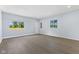 Large bonus room with neutral walls and flooring, perfect for entertaining at 4305 Five Points Rd, Indianapolis, IN 46239