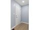 Entryway with wood floors and freshly painted walls at 4305 Five Points Rd, Indianapolis, IN 46239
