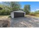 Two car garage with adjacent grassy area at 4305 Five Points Rd, Indianapolis, IN 46239
