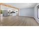 Open floor plan with abundant natural light and wood floors at 4305 Five Points Rd, Indianapolis, IN 46239