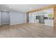 Open floor plan with abundant natural light and wood floors at 4305 Five Points Rd, Indianapolis, IN 46239