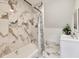 Bathroom featuring marble tile, a shower with curtain, and white vanity at 44 S Tremont St, Indianapolis, IN 46222
