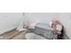Stylish bedroom featuring a teepee, plush pillows, and a decorative side table for added comfort at 44 S Tremont St, Indianapolis, IN 46222