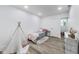 Cozy bedroom features a teepee, comfy bed, and stylish decor, perfect for relaxation at 44 S Tremont St, Indianapolis, IN 46222