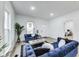 Bright living room featuring modern decor, ample natural light, and stylish furnishings for a comfortable living space at 44 S Tremont St, Indianapolis, IN 46222