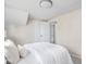 Bright and airy bedroom featuring an ensuite bathroom and built-in closet space for efficient storage at 4523 Kingsley Dr, Indianapolis, IN 46205